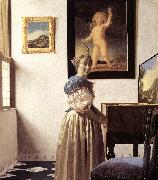 VERMEER VAN DELFT, Jan Lady Standing at a Virginal er oil on canvas